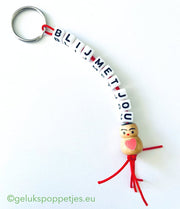 Keychain happy with you with lucky doll with heart on the belly