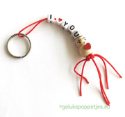 I love you keychain with a lucky charm heart on the belly