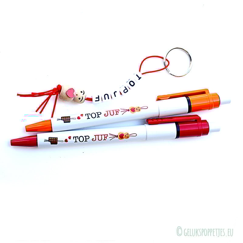 Keyring top teacher with lucky doll heart on the belly