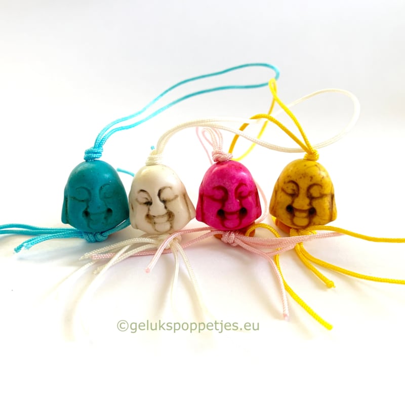 Lucky Buddha head doll while supplies last