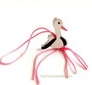 Pink stork lucky charm