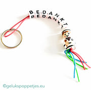 Thank you keychain with lucky baker doll