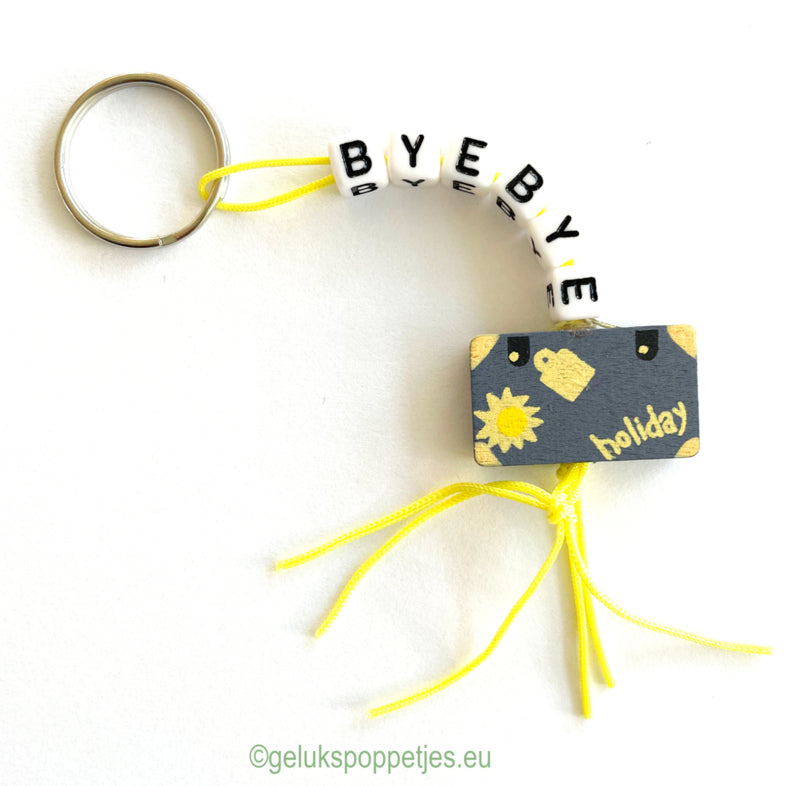 Keychain byebye with lucky charm suitcase