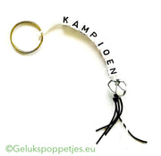 Champion keychain with lucky football figure