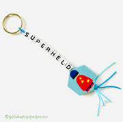Keychain superhero with lucky charm superhero