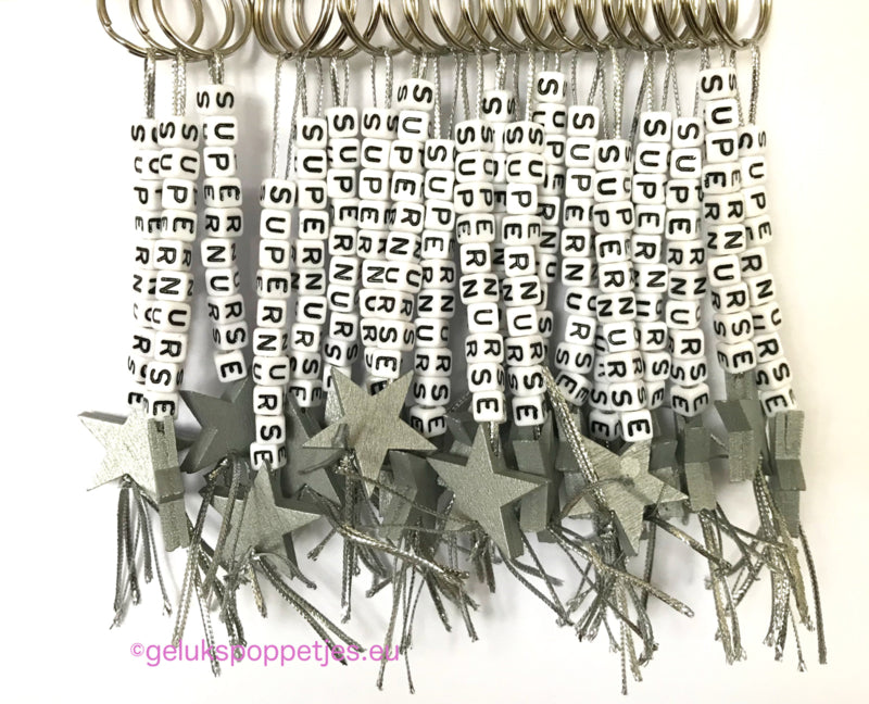 Supernurse keychain with lucky nurse doll