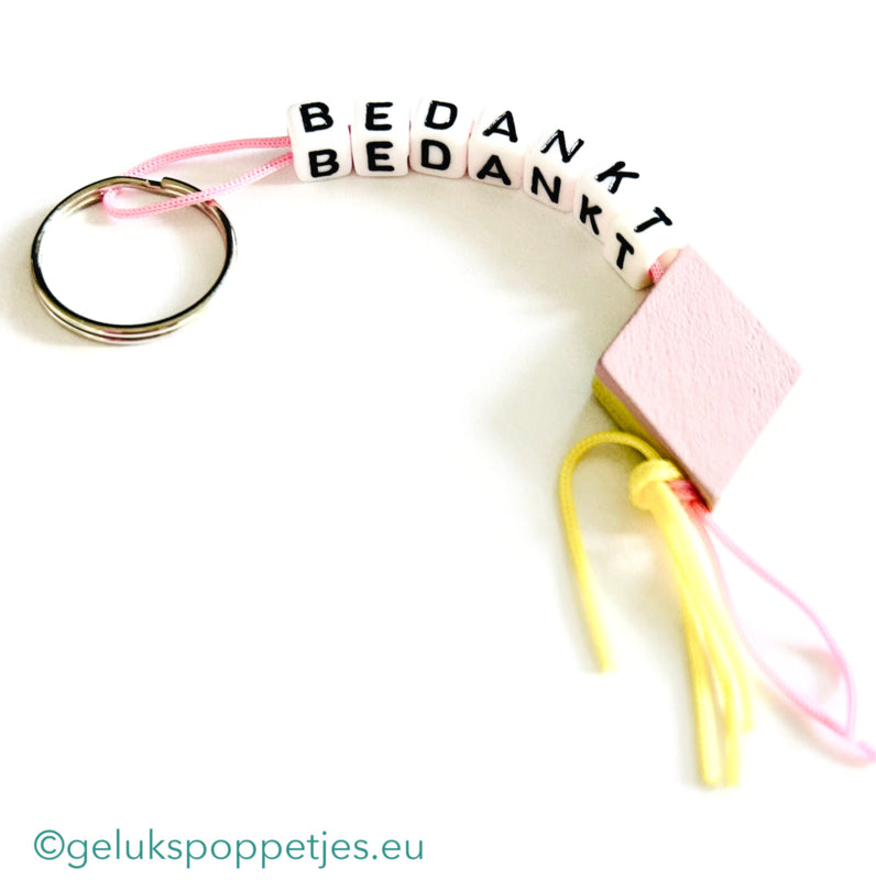 Thank you keychain with a lucky bacon doll