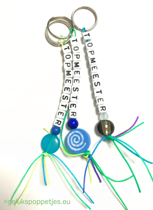 Keyring top teacher made of handmade lucky dolls