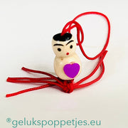 Lucky doll with purple heart on the belly