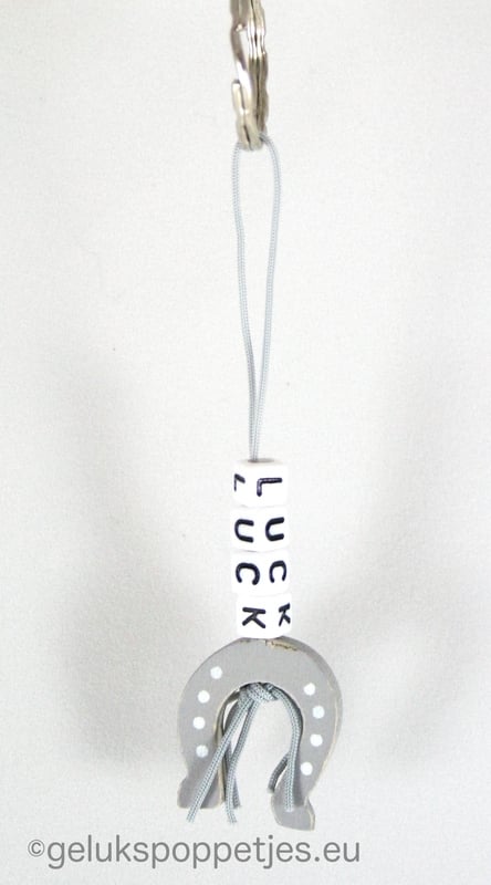 Keychain luck with lucky horseshoe doll