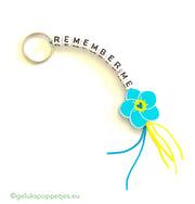 Keychain remember me with lucky doll forget me not