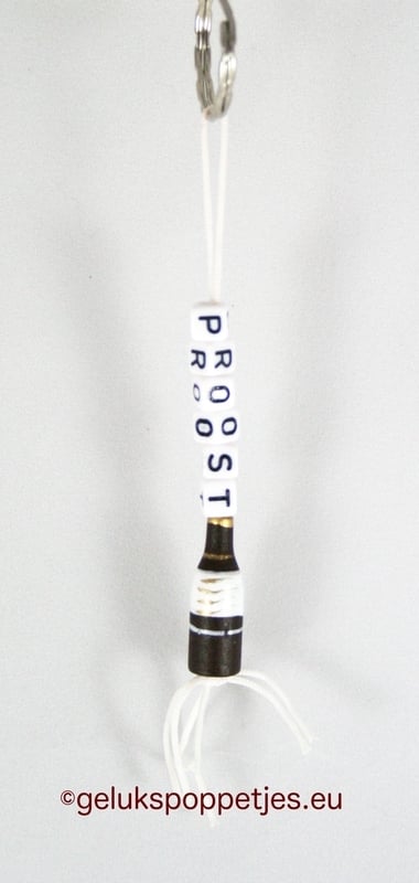 Keychain cheers with lucky charm bottle