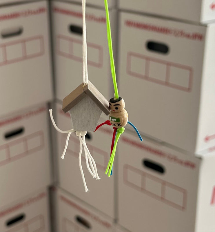 Name keychain with lucky charm house