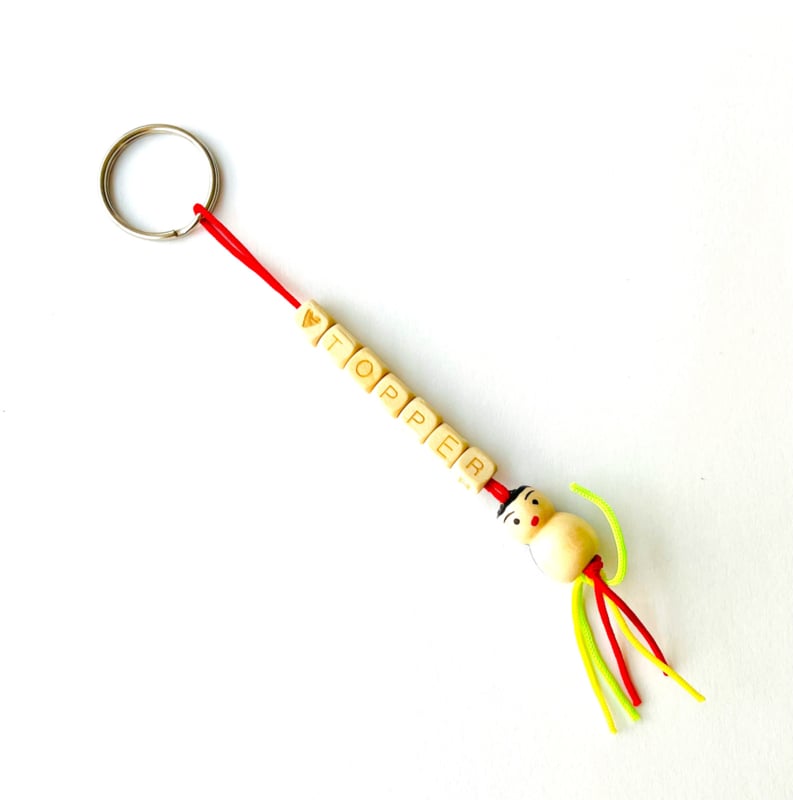 FSC letter keychain topper with wooden lucky charm