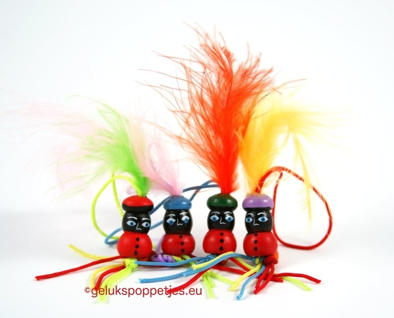 Lucky Piet doll with colored feathers