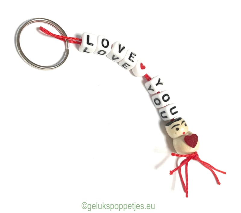 Keychain love❤️you with lucky charm heart on the belly