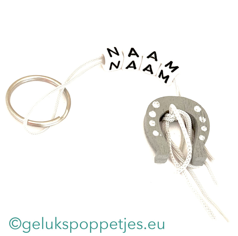 Name keychain with horseshoe lucky charm