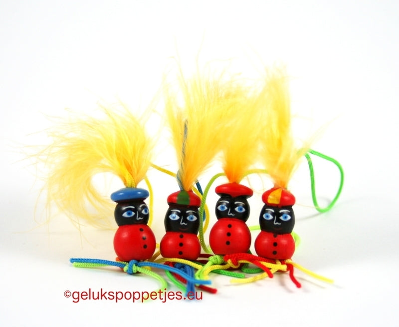 Lucky Piet doll with yellow feather
