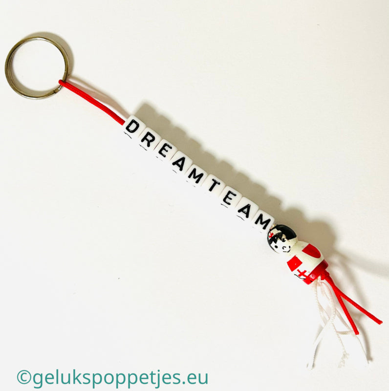 Dream team keychain with lucky sister doll