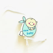 Lucky charm baby boy in cloth