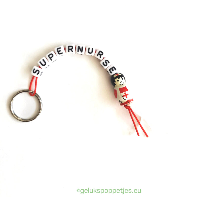 Supernurse keychain with lucky nurse doll