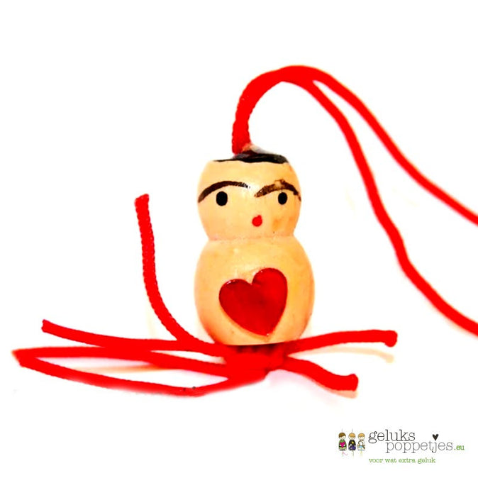 Lucky doll with heart on the belly