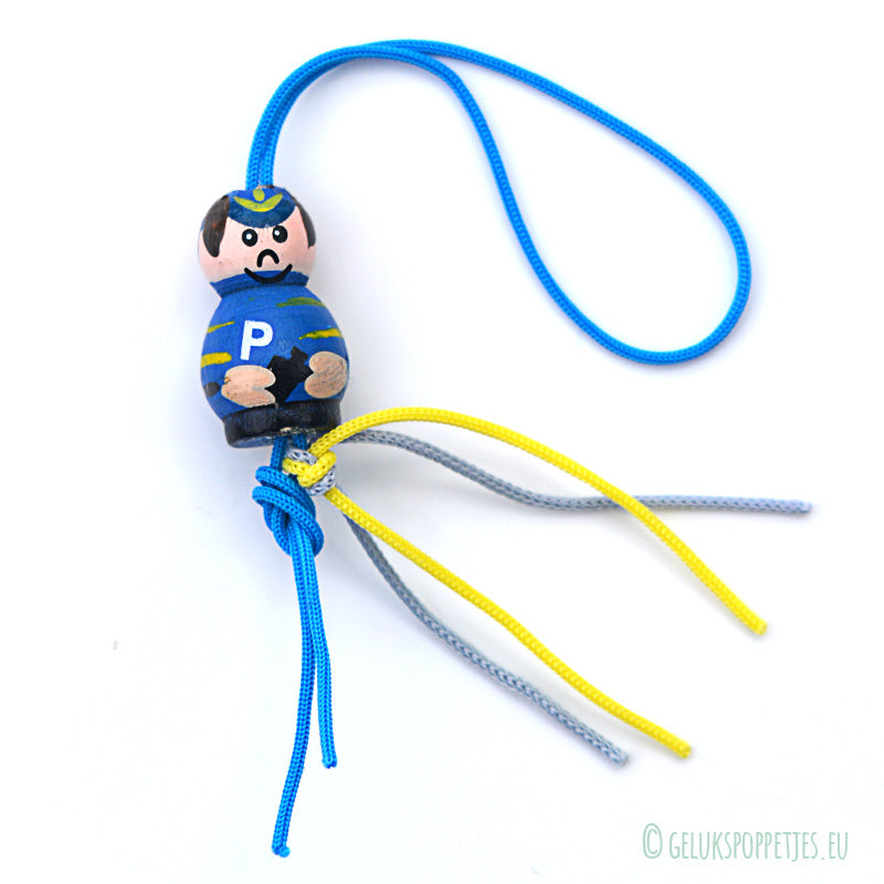 Lucky policeman doll