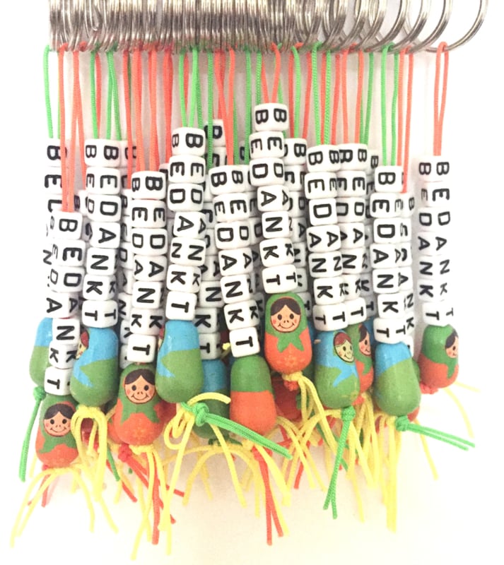 Thank you keychain with lucky matryoshka doll