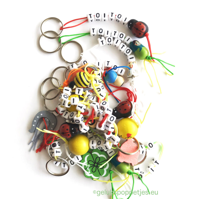 Thank you keychain with various lucky charms