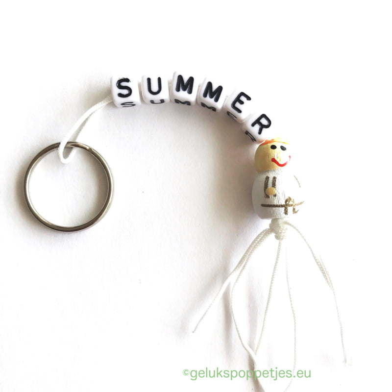 Summer keychain with lucky angel figure without wings