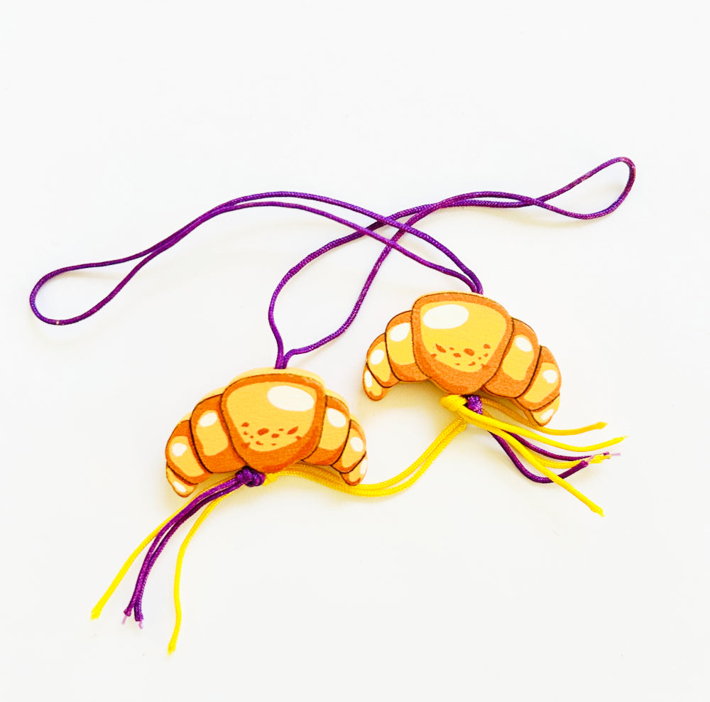 Name keychain with croissant lucky charm