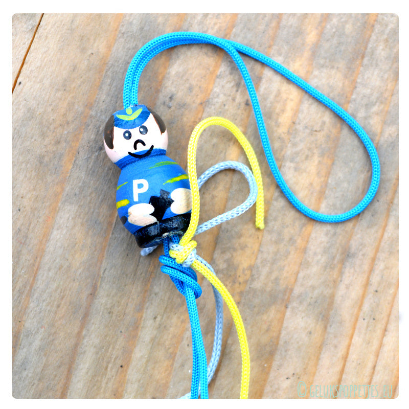 Lucky policeman doll