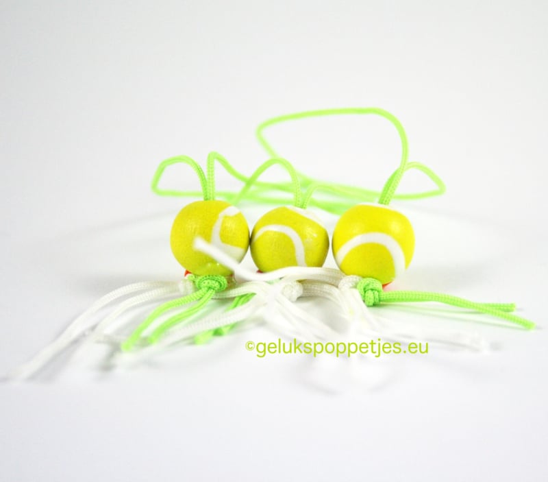 Lucky doll tennis ball