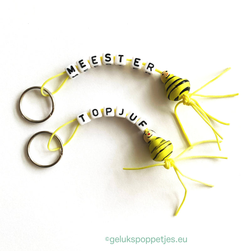 Keyring master with lucky bee doll