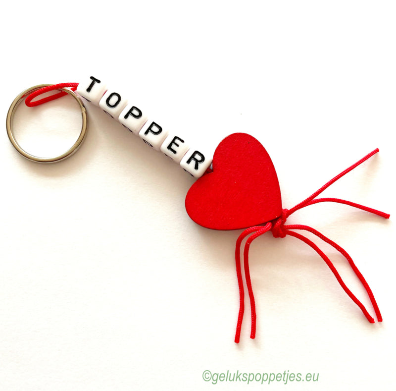 Key ring topper with lucky doll wooden heart