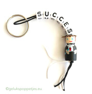 Keyring with lucky charm and professor