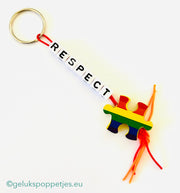 Keychain respect with lucky charm puzzle piece