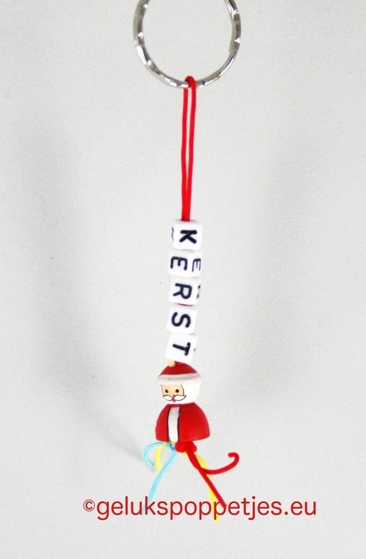 Christmas keychain with lucky Santa Claus figure