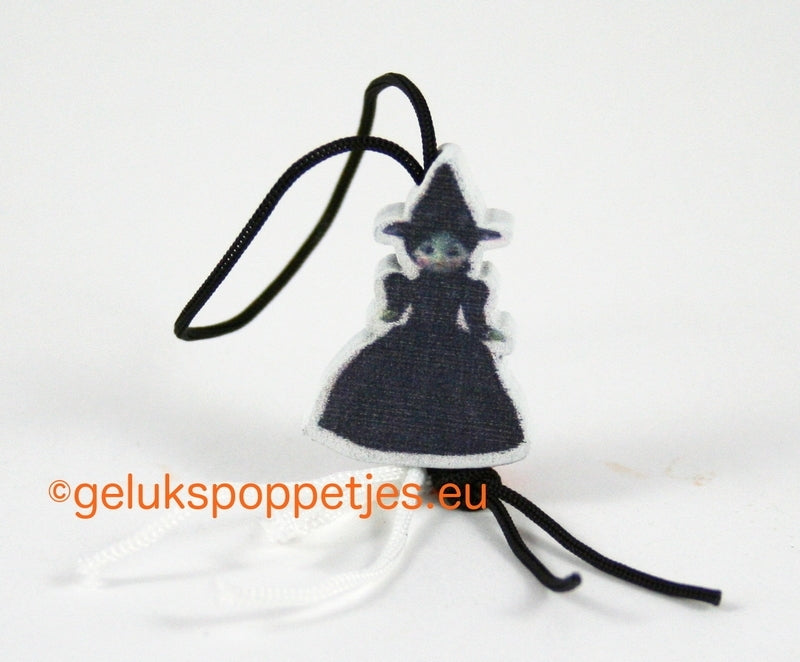 Lucky witch doll while supplies last