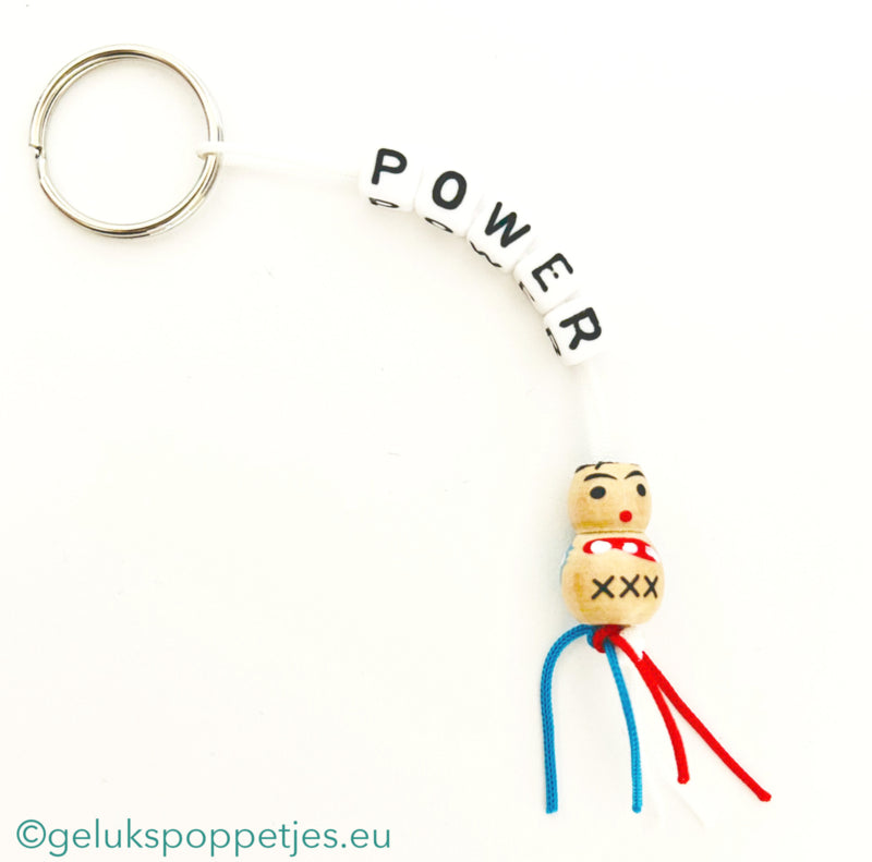 Keyring power with wooden lucky doll