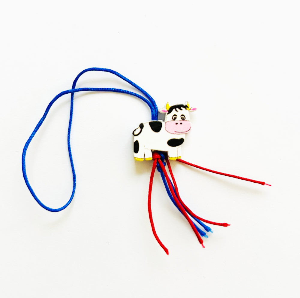 Personalized keychain with cow lucky charm