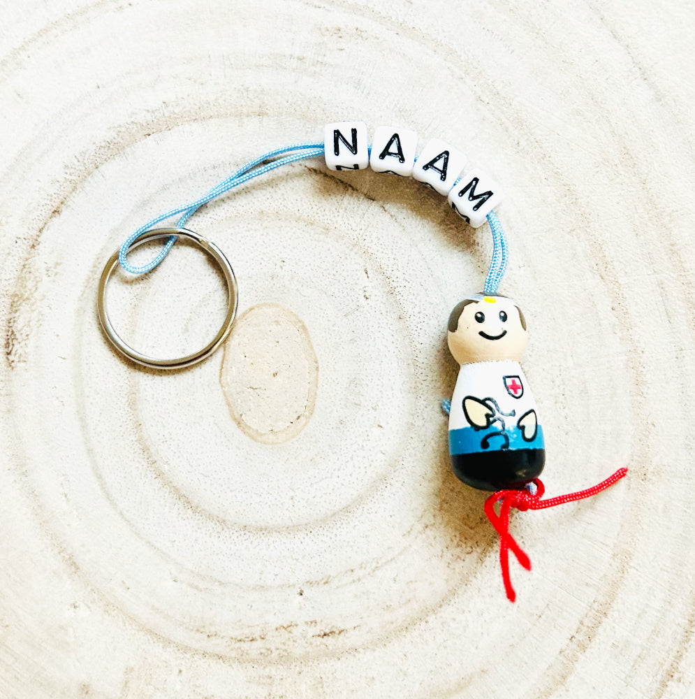 Name keyring with lucky charm doctor