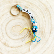 Name keychain with police officer lucky charm