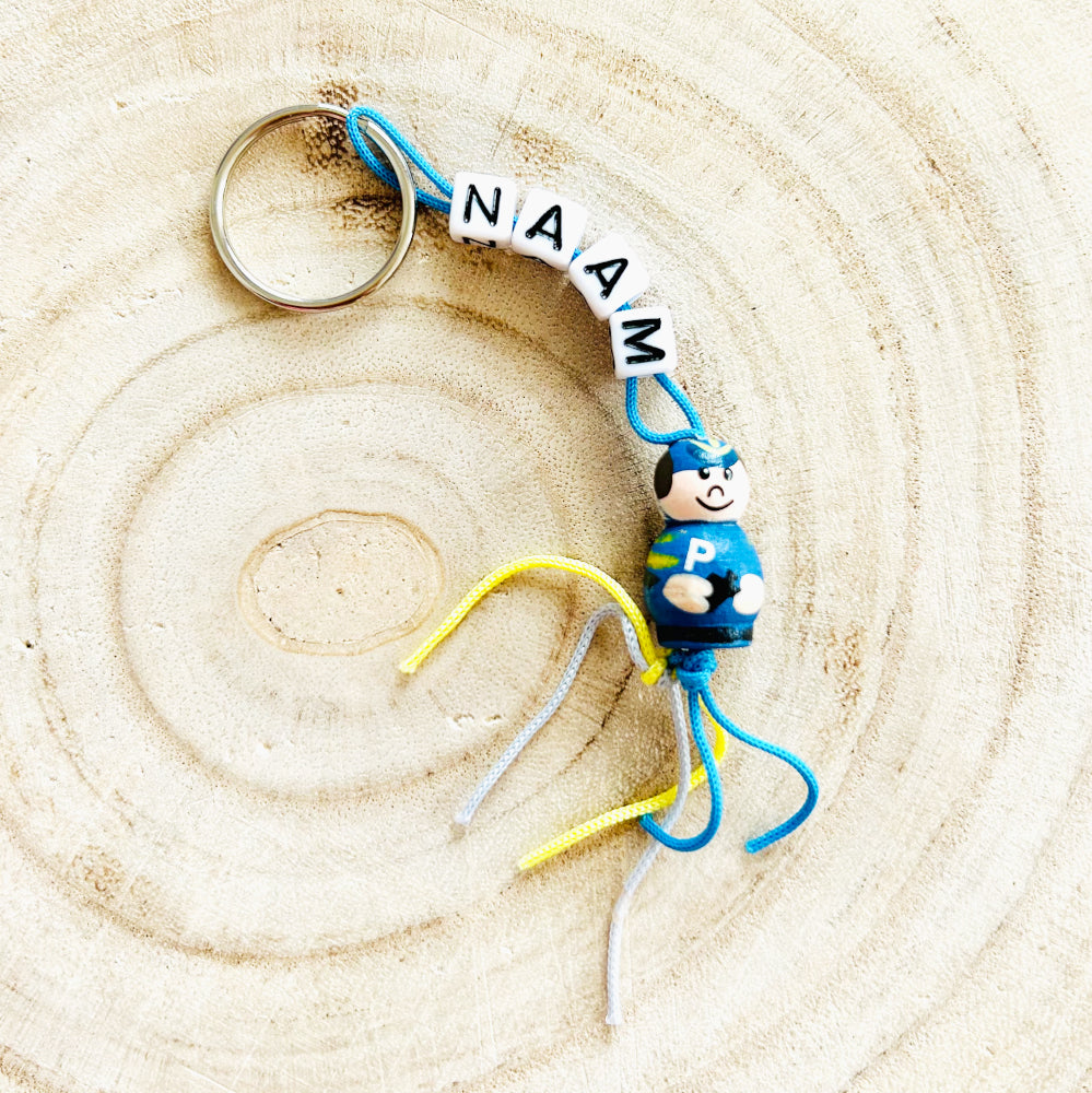 Name keychain with police officer lucky charm