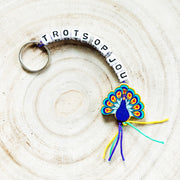 Keychain proud of you with lucky peacock charm
