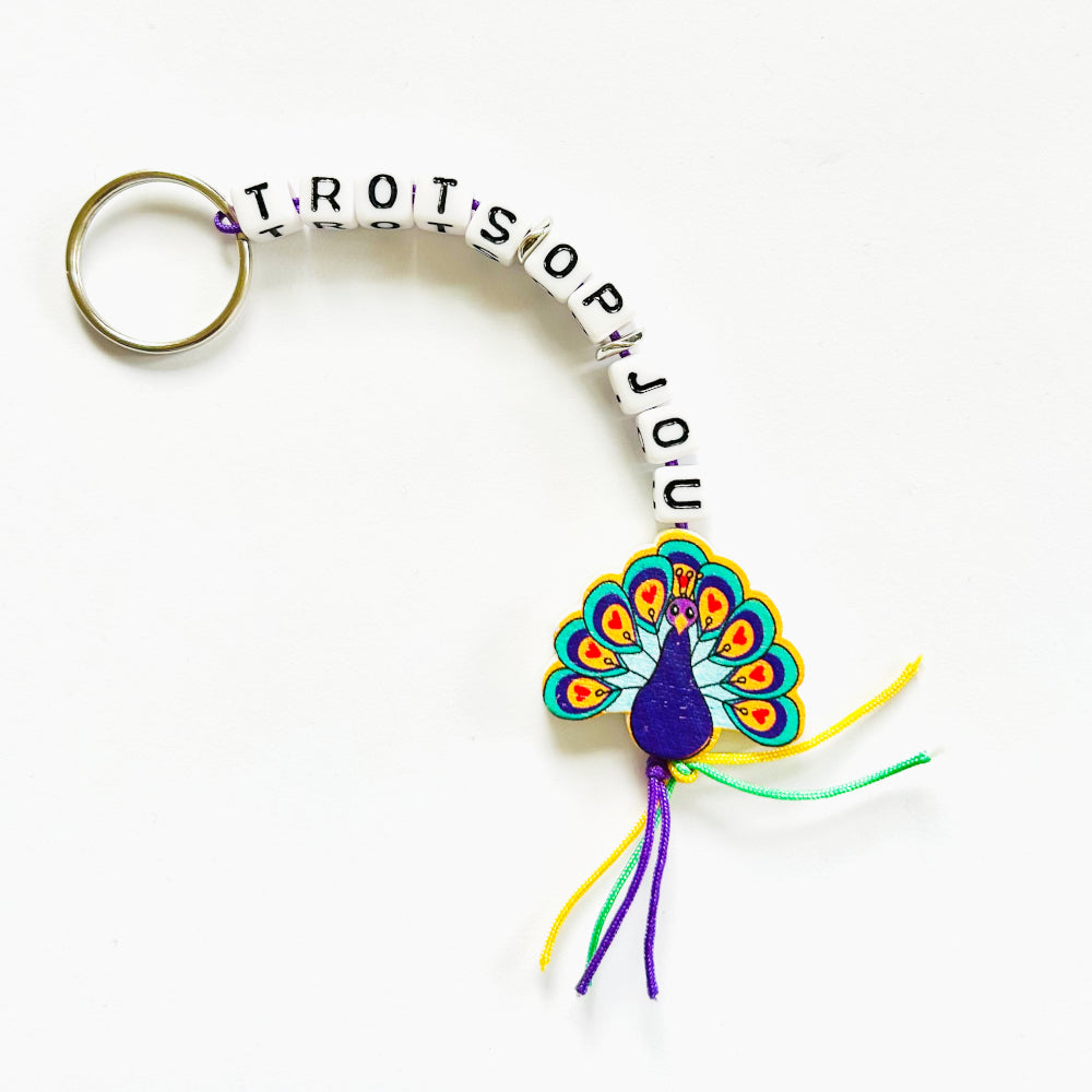 Keychain proud of you with lucky peacock charm